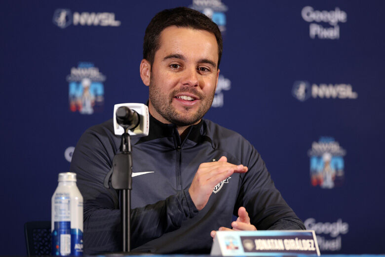 Head coach Jonatan Giráldez of the Washington Spirit addresses the media ahead of the NWSL 2024 Championship at CPKC Stadium on November 22, 2024 in Kansas City, Missouri.