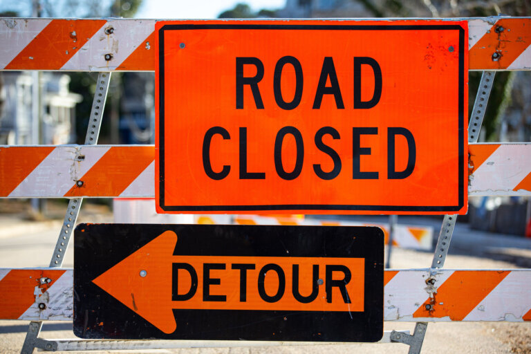 Road closed and detour signs