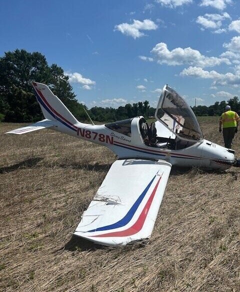 small plane crashed in field