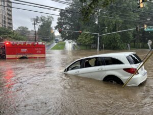 Fire truck and vehicle flooded in Silver Spring