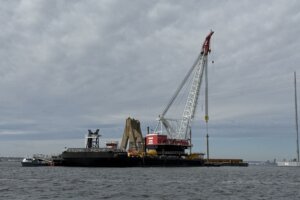 Construction rig to build new bridge in water