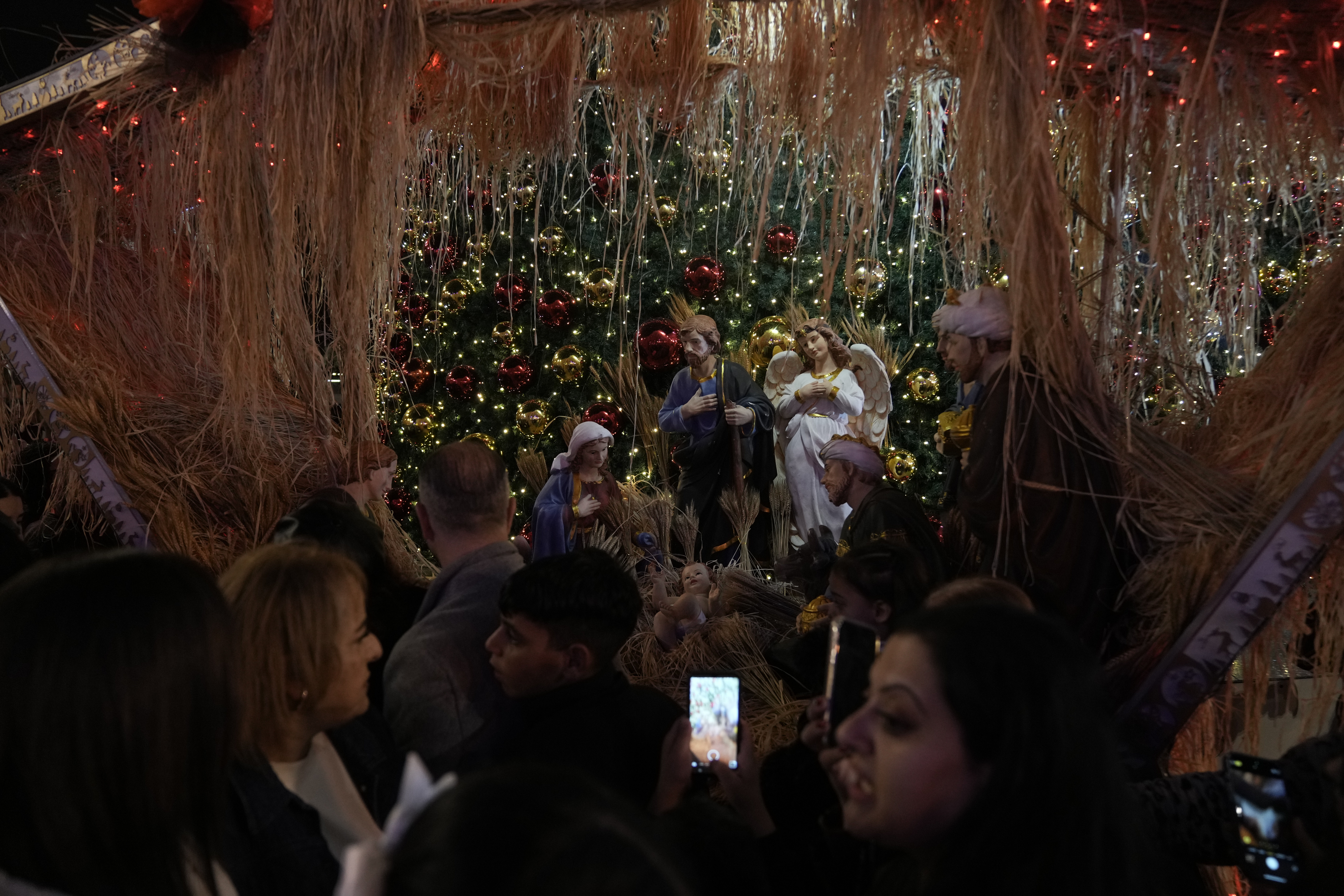 Palestinians take part in Christmas tree–lighting event
