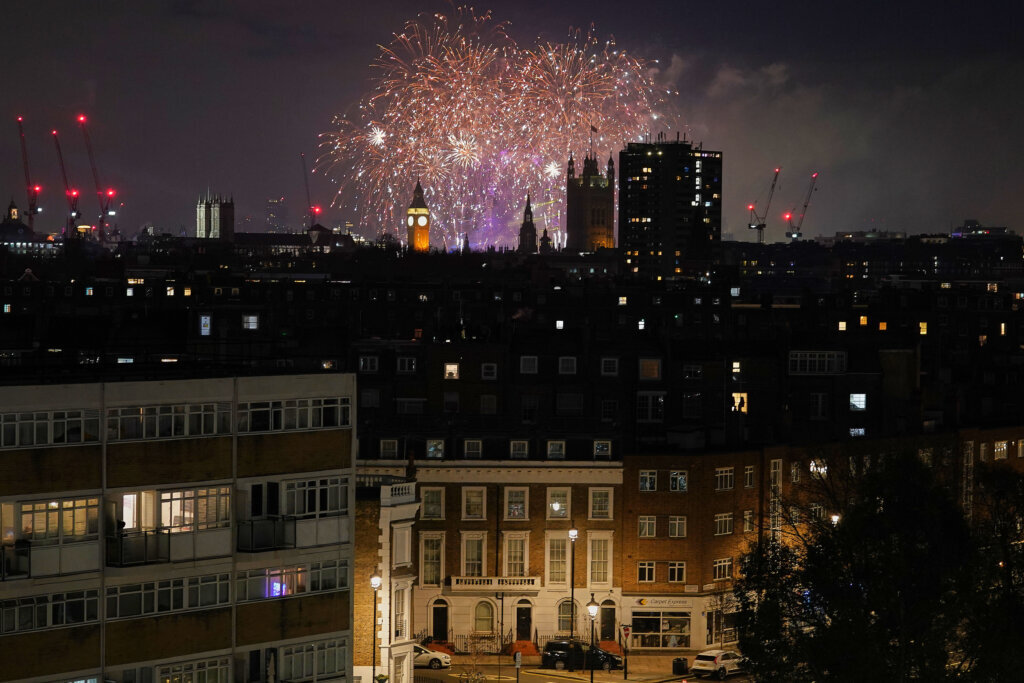 Fireworks light-up the sky in central London to celebrate the New Year on Thursday, Jan. 1, 2026. (AP Photo/Alberto Pezzali)