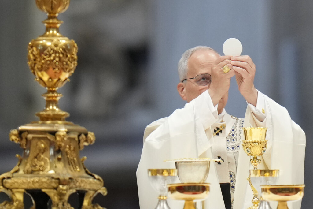 Pope Leo XIV celebrates a mass on New Year's Day, in St. Peter's Basilica at the Vatican, Thursday, Jan. 1, 2026. (AP Photo/Alessandra Tarantino)
