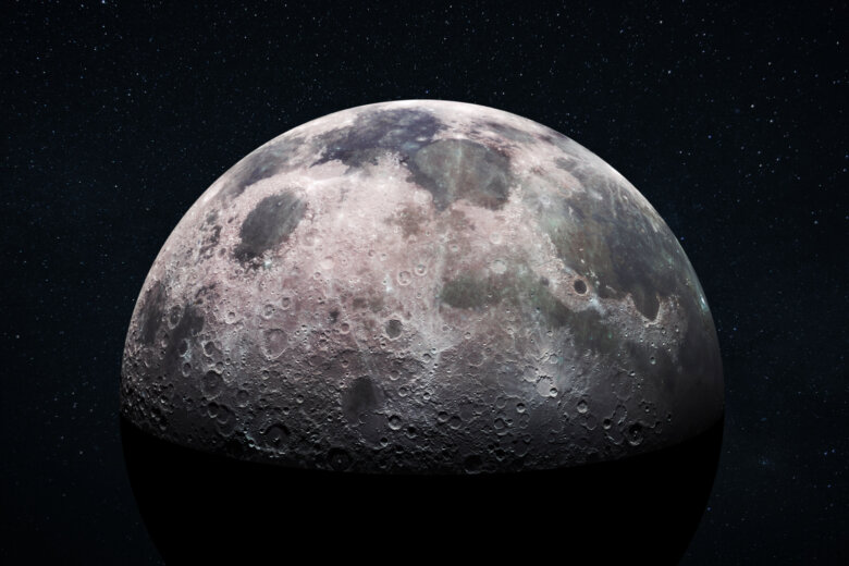 Space view of the moon's cratered surface with a star filled outer space background. Deep space exploration and astronomy concept. Moon with detailed craters and surface