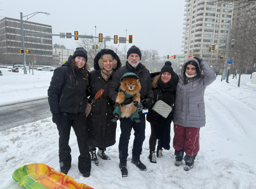 The Mirala family goes out for a walk in Chevy Chase during a winter storm.
