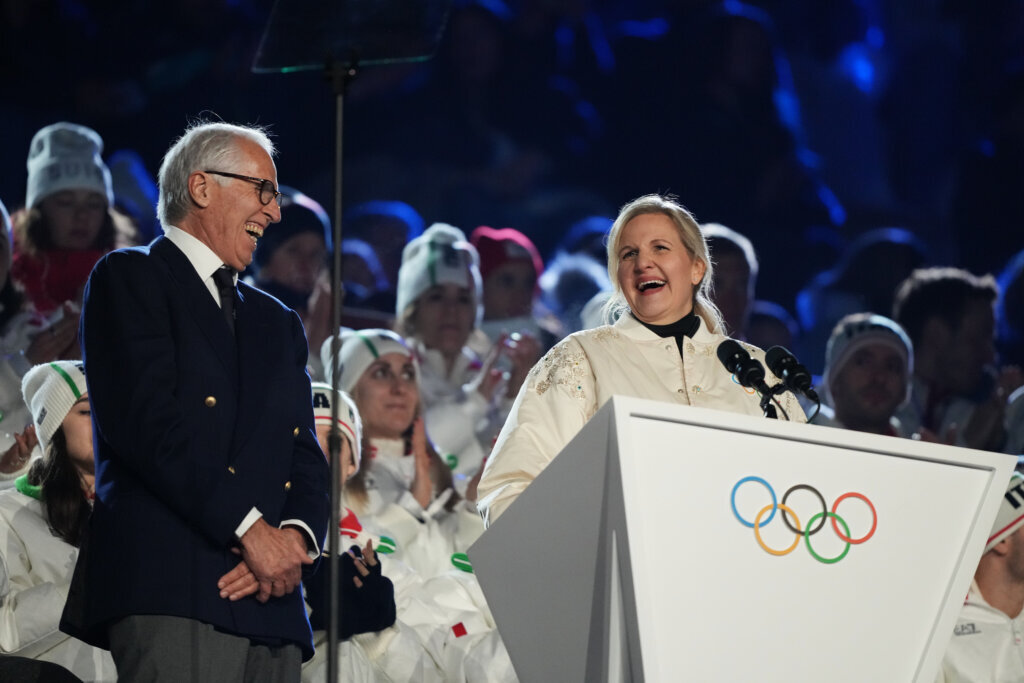 President of the Milan Cortina 2026 foundation Giovanni Malago, left, listens as IOC President Kirsty Coventry, right, speaks during the closing ceremony of the 2026 Winter Olympics, in Verona, Italy, Sunday, Feb. 22, 2026. (AP Photo/Natacha Pisarenko)