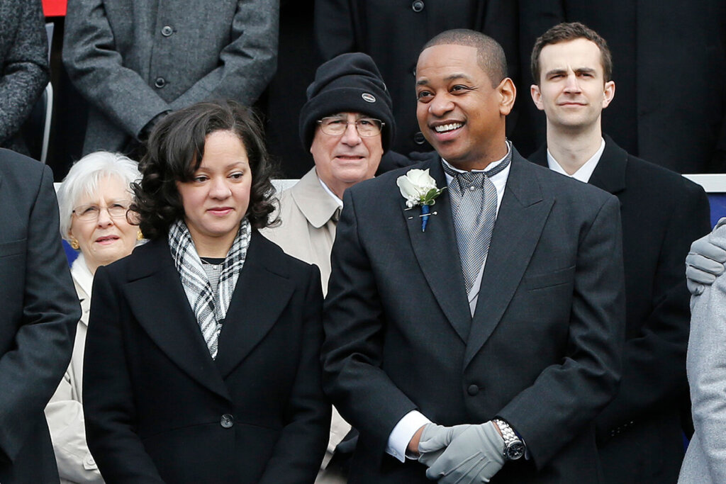 FILE - Lt. Gov. Justin Fairfax, right, and his wife, Cerina, at the inauguration of Gov. Ralph Northam at the Capitol in Richmond, Va., Saturday, Sept. 13, 2018. Former Virginia Lt. Gov. Justin Fairfax, a rising star in the Democratic Party until sexual assault allegations ruined his political fortunes, killed his estranged wife and then himself weeks before a judge’s deadline to move out of their family home, according to police and court records. (AP Photo/Kevin Morley, File)