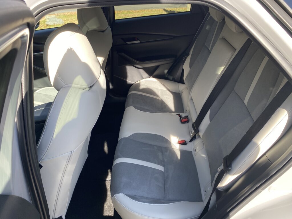 While it feels upscale, it's also a little crowded. The rear seat is definitely on the small side and the cargo area is modest.