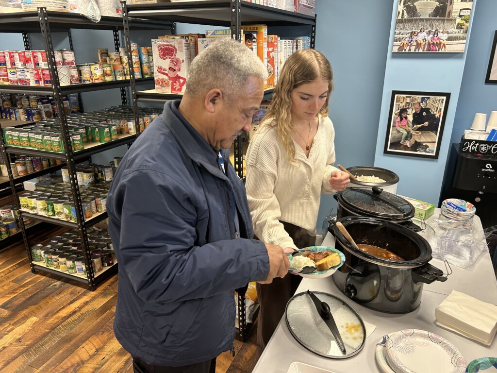 Two people cooking