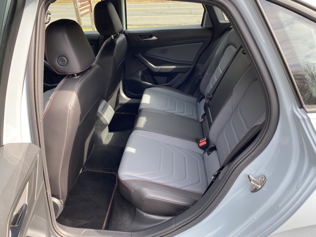 Inside, there’s a black-and-gray leather interior to enjoy, with red stitching to boot.