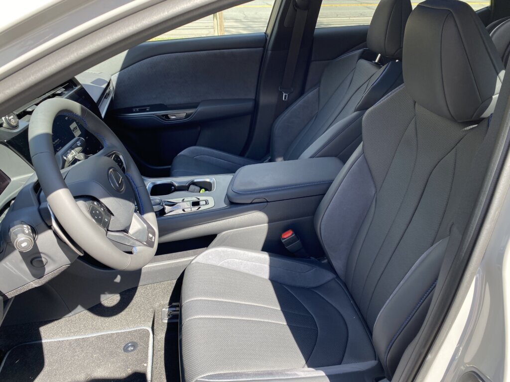 Inside there is black Ultrasuede trim with blue stitching.