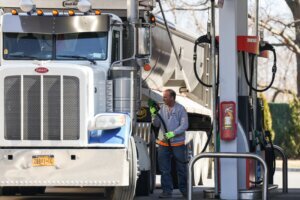 Diesel truck driver fills up gas tank on Long Island