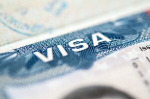 Close up,View,Of,A,Us,Visa,Stamped,On,A,Passport