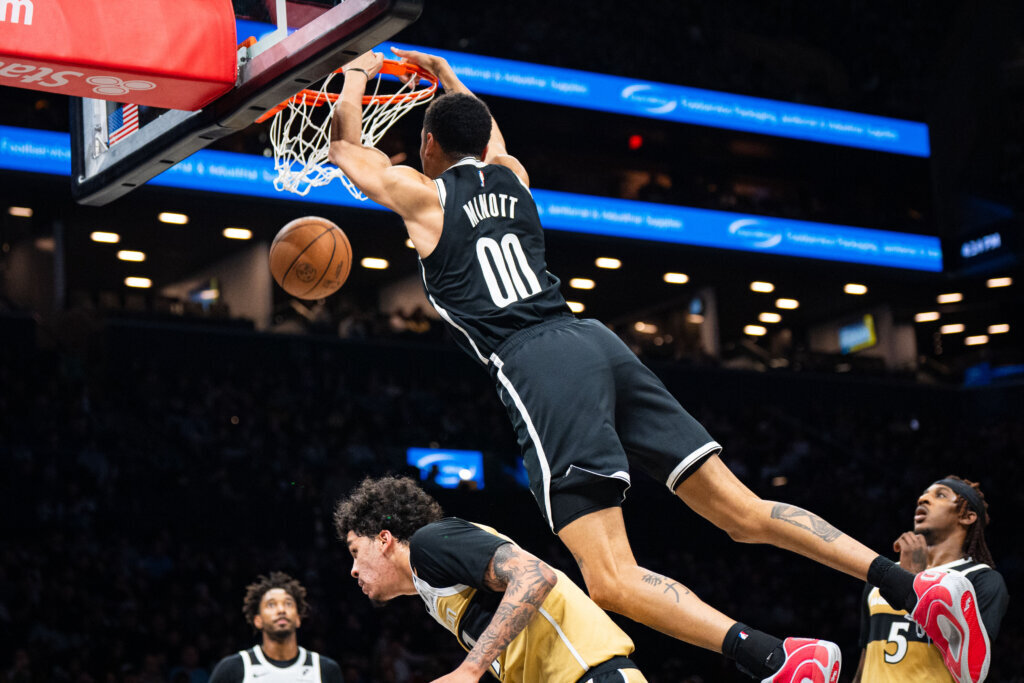 Brooklyn Nets forward Josh Minott dunking the basketball