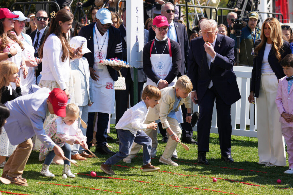 President Donald Trump and first lady Melania Trump participate in the White House Easter Egg Roll on the South Lawn of the White House, Monday, April 6, 2026. (AP Photo/Mark Schiefelbein)