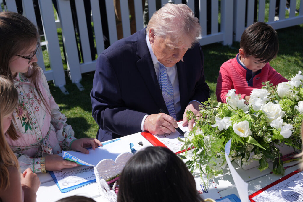 President Donald Trump sits down with children as he participates in the White House Easter Egg Roll on the South Lawn of the White House, Monday, April 6, 2026, in D.C. (AP Photo/Alex Brandon)