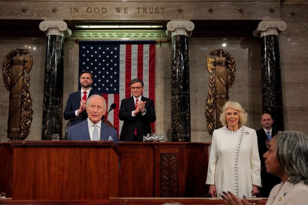 Britain's King Charles III addresses a joint meeting of Congress while Vice President JD Vance, back left, House Speaker Mike Johnson, R-La., back right, applaud and Queen Camilla, right, looks on, in the House Chamber of the U.S. Capitol in Washington, Tuesday, April 28, 2026. (Kylie Cooper/Pool via AP)