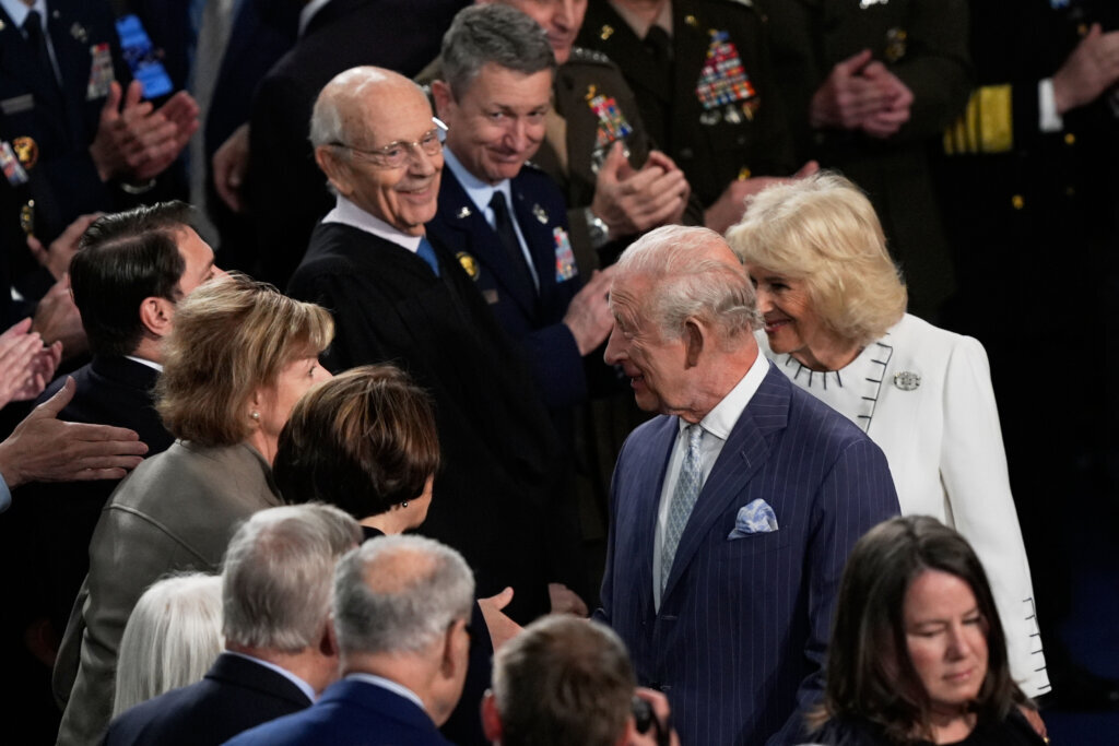 Britain's King Charles III and Queen Camilla are greeted before a joint meeting of Congress in the House Chamber at the U.S. Capitol, Tuesday, April 28, 2026, in Washington. (AP Photo/Manuel Balce Ceneta)