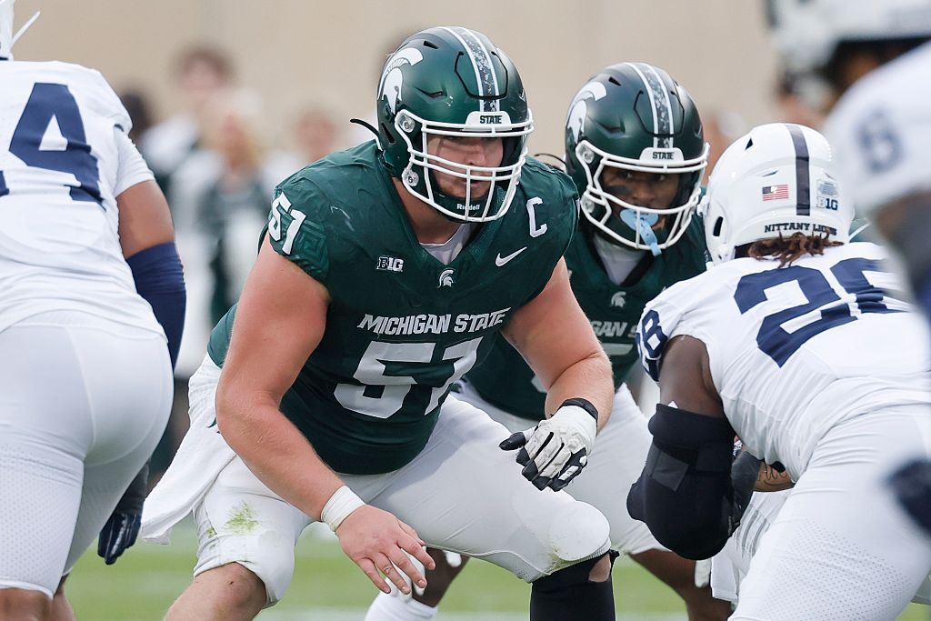 EAST LANSING, MICHIGAN - NOVEMBER 15: Matt Gulbin #51 of the Michigan State Spartans at center against the Penn State Nittany Lions during the first half at Spartan Stadium on November 15, 2025 in East Lansing, Michigan. (Photo by Duane Burleson/Getty Images)