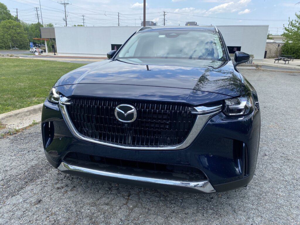 The latest plug-in hybrid version of the Mazda CX-90, pairs a four-cylinder engine with an electric motor. That powertrain delivers an all-electric range of up to 26 miles, according to Mazda. (WTOP/John Aaron)