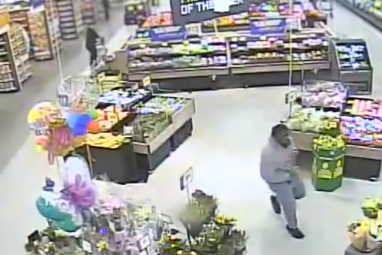 Boy running through a Giant Food grocery store