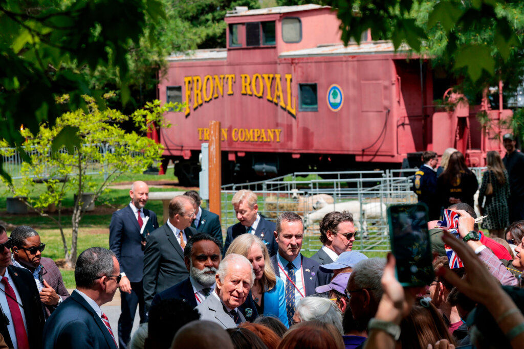 Britain's King Charles walks among community members during a block party in Front Royal, Virginia, Thursday, April 30, 2026. (Kylie Cooper/Pool Photo via AP)