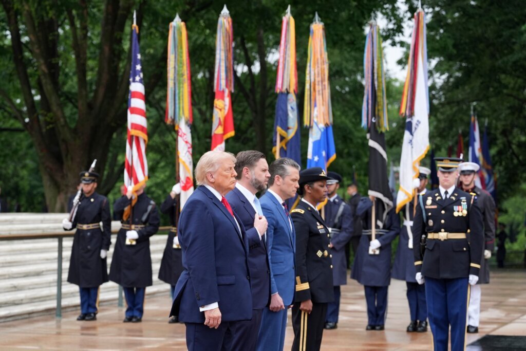 President Donald Trump, from left, stands alongside Vice President JD Vance, Secretary of Defense Pete Hegseth and Maj. Gen. Antoinette Gant, commanding general of the Joint Task Force-National Capital Region and the U.S. Army Military District of Washington, at the Tomb of the Unknown Soldier in Arlington National Cemetery on Memorial Day, Monday, May 25, 2026, in Arlington, Va. (AP Photo/Alex Brandon)