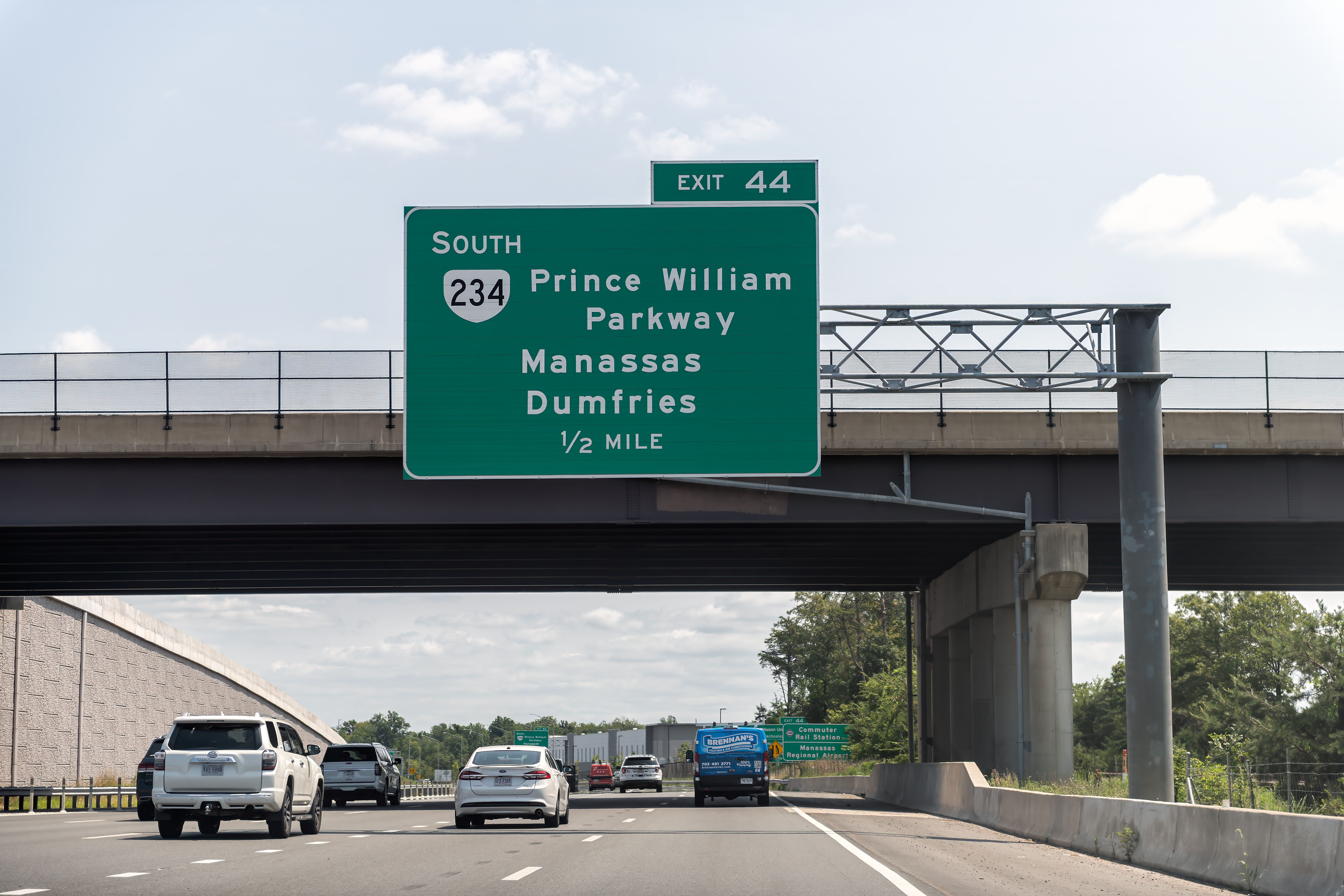 Highway i 95 interstate road in Virginia with cars in morning traffic Washington DC, sign for Prince William Parkway