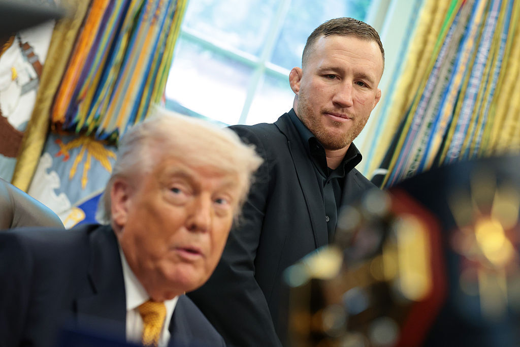 UFC fighter Justin Gaethje listens as U.S. President Donald Trump speaks to the media during an event in the Oval Office of the White House on May 6, 2026 in Washington, D.C. (Photo by Anna Moneymaker/Getty Images)