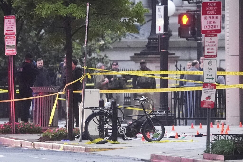 Evidence markers are seen on a crime scene